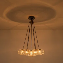 Black 7-Light Cluster Clear Glass Oval Globe Chandelier
