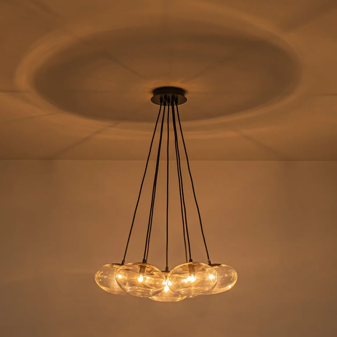 Black 7-Light Cluster Clear Glass Oval Globe Chandelier