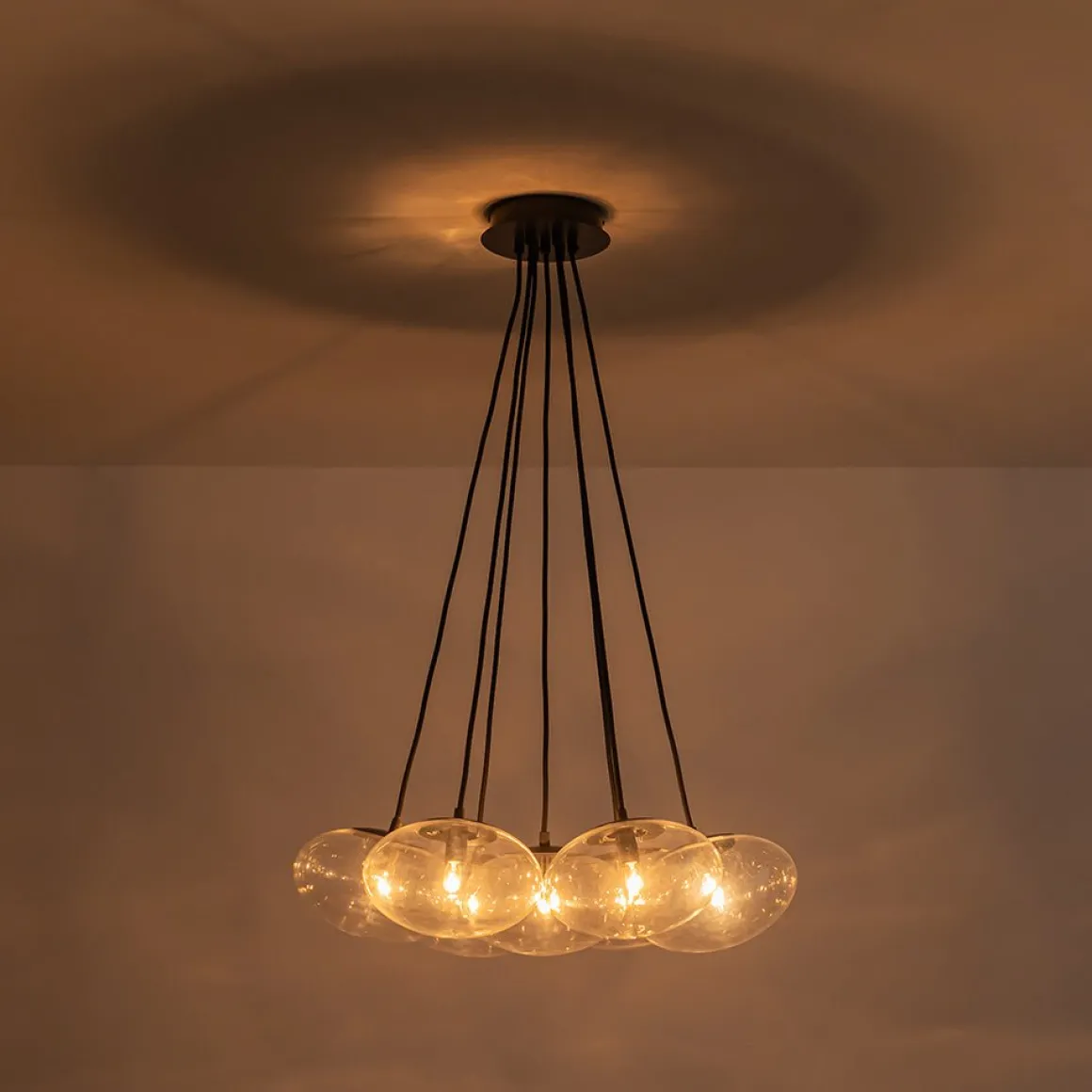 Black 7-Light Cluster Clear Glass Oval Globe Chandelier