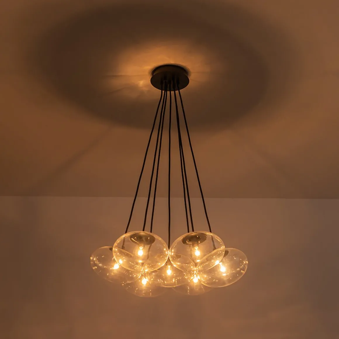 Black 7-Light Cluster Clear Glass Oval Globe Chandelier