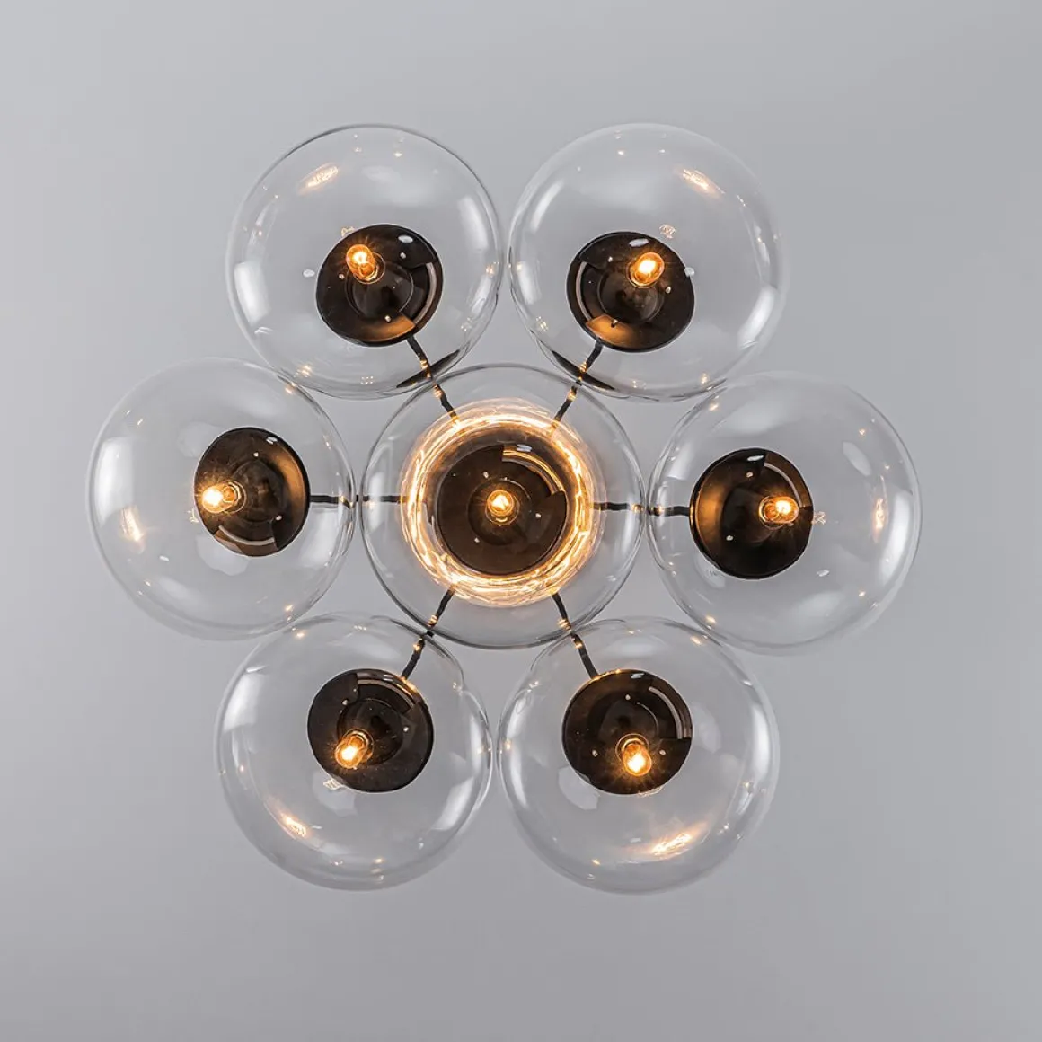 Black 7-Light Cluster Clear Glass Oval Globe Chandelier