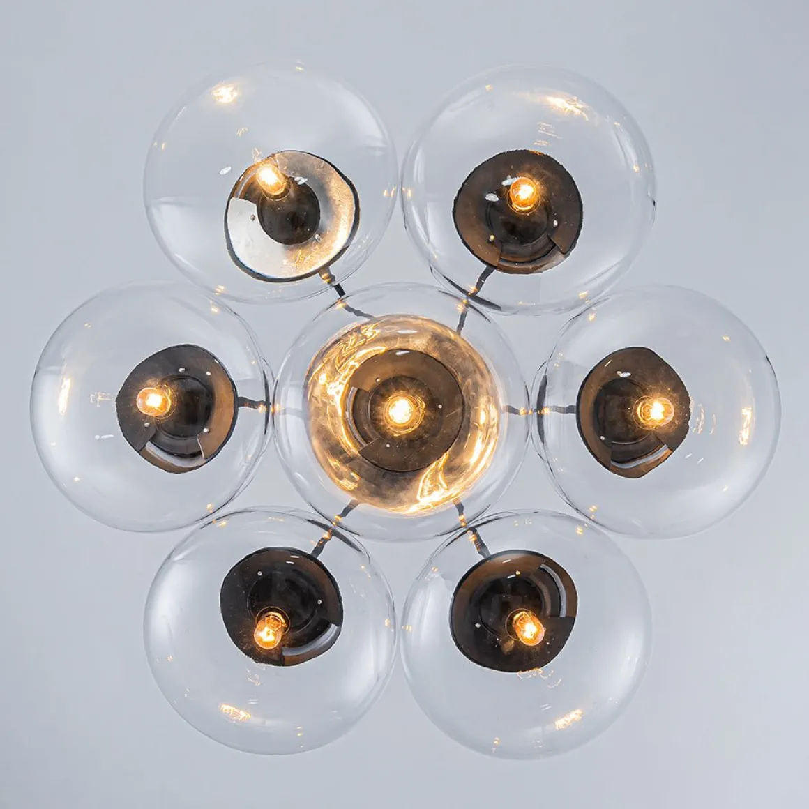 Black 7-Light Cluster Clear Glass Oval Globe Chandelier