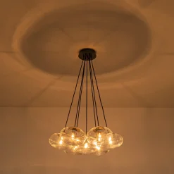 Black 7-Light Cluster Clear Glass Oval Globe Chandelier