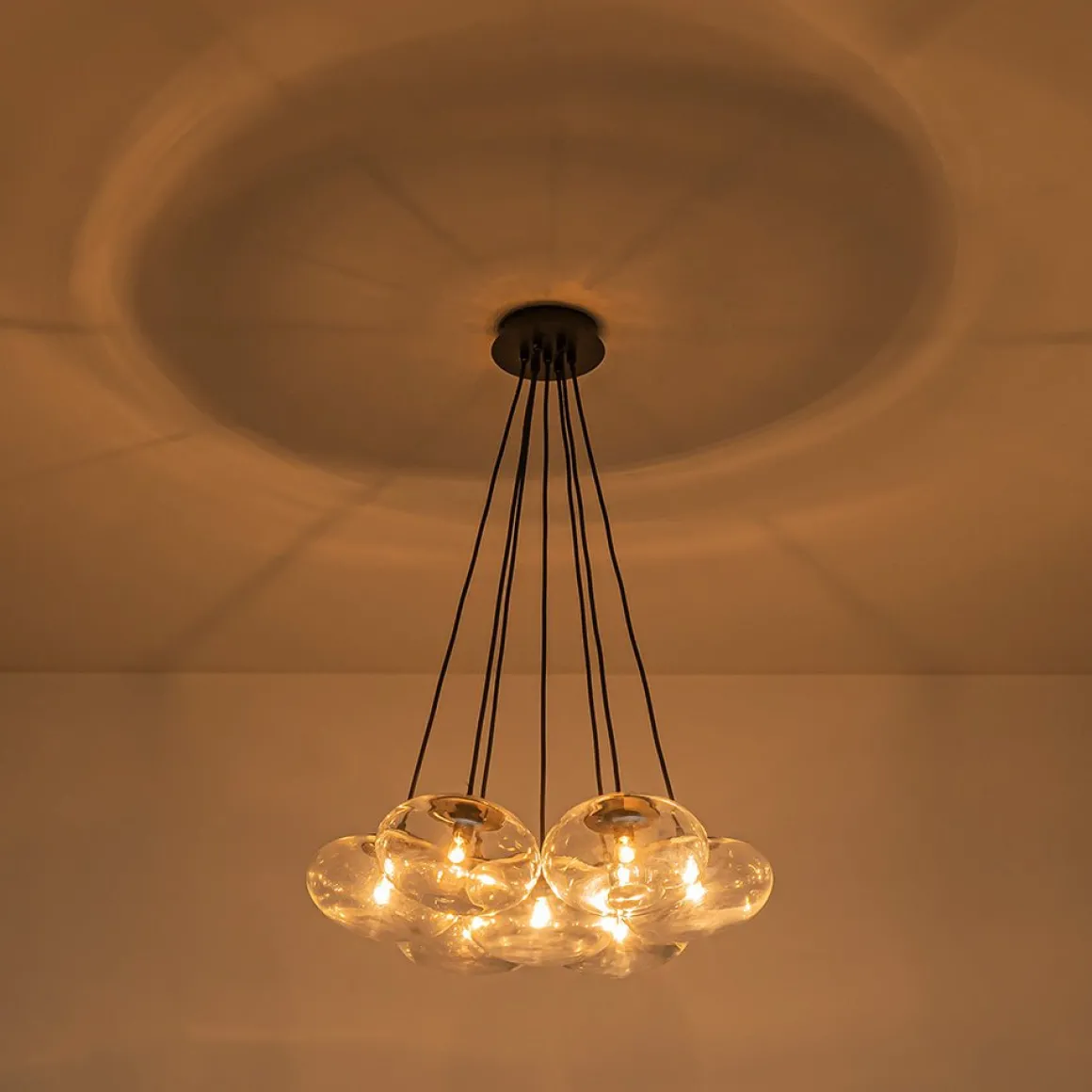 Black 7-Light Cluster Clear Glass Oval Globe Chandelier