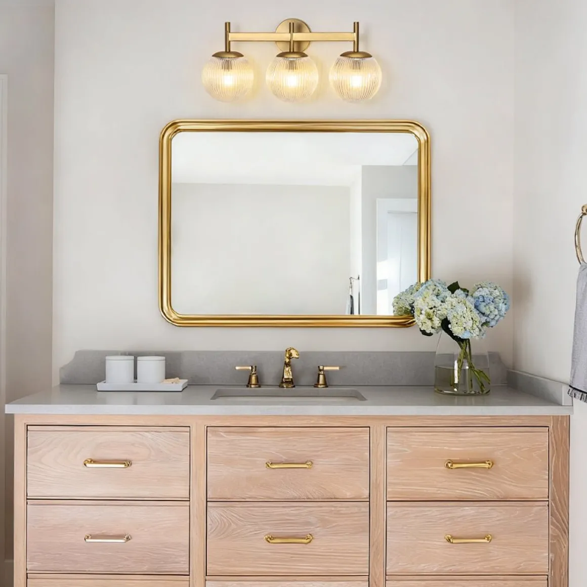 3-Light Brass Ribbed Glass Globe Vanity Wall Sconce