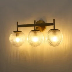 3-Light Brass Ribbed Glass Globe Vanity Wall Sconce