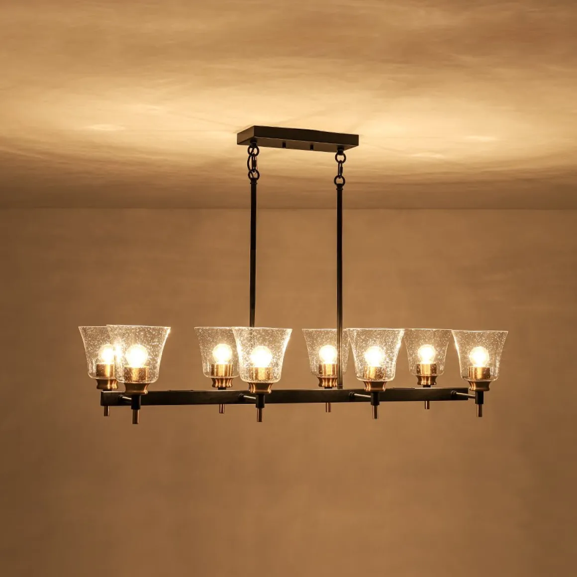 8-Light Seeded Glass Black Brass Linear Island Chandelier