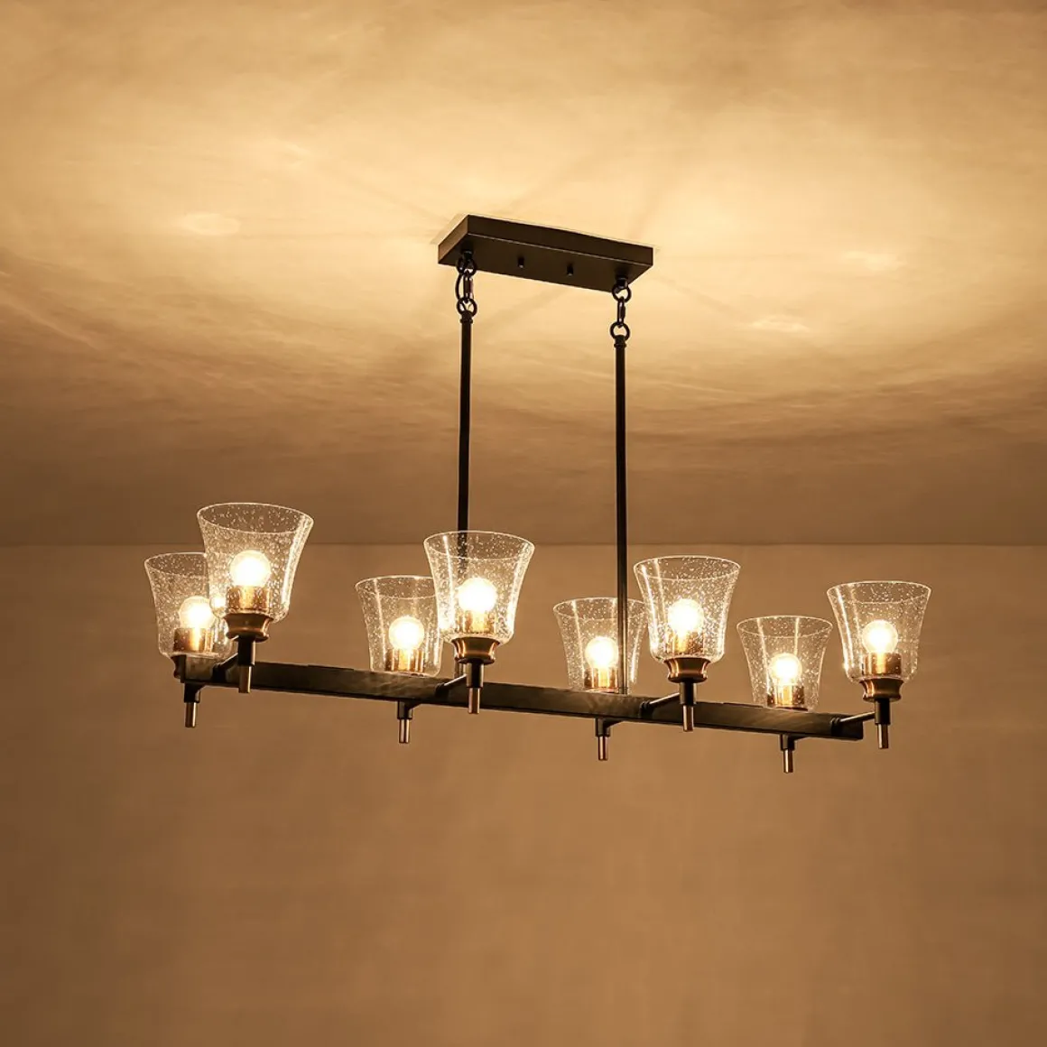 8-Light Seeded Glass Black Brass Linear Island Chandelier