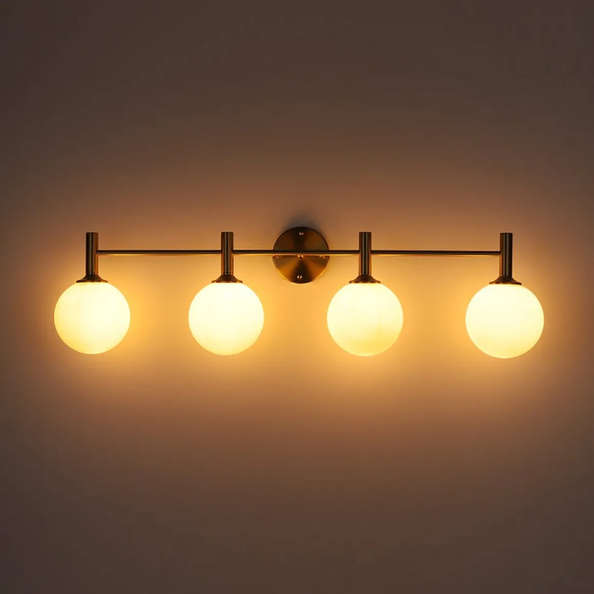 Mid-Century Brass 4-Light Glass Globe Vanity Sconce