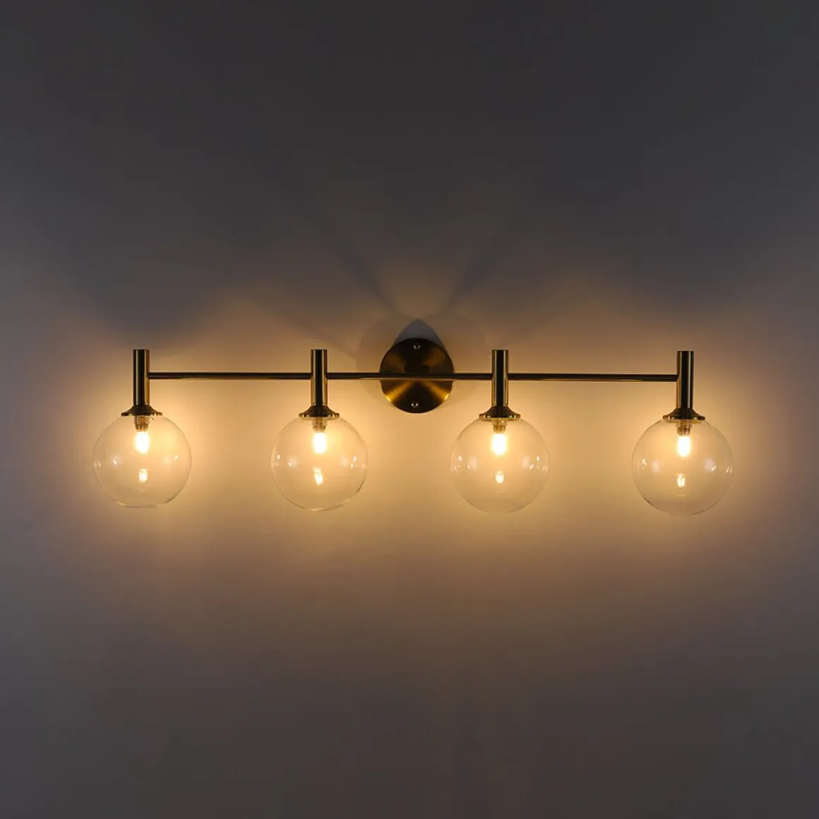Mid-Century Brass 4-Light Glass Globe Vanity Sconce