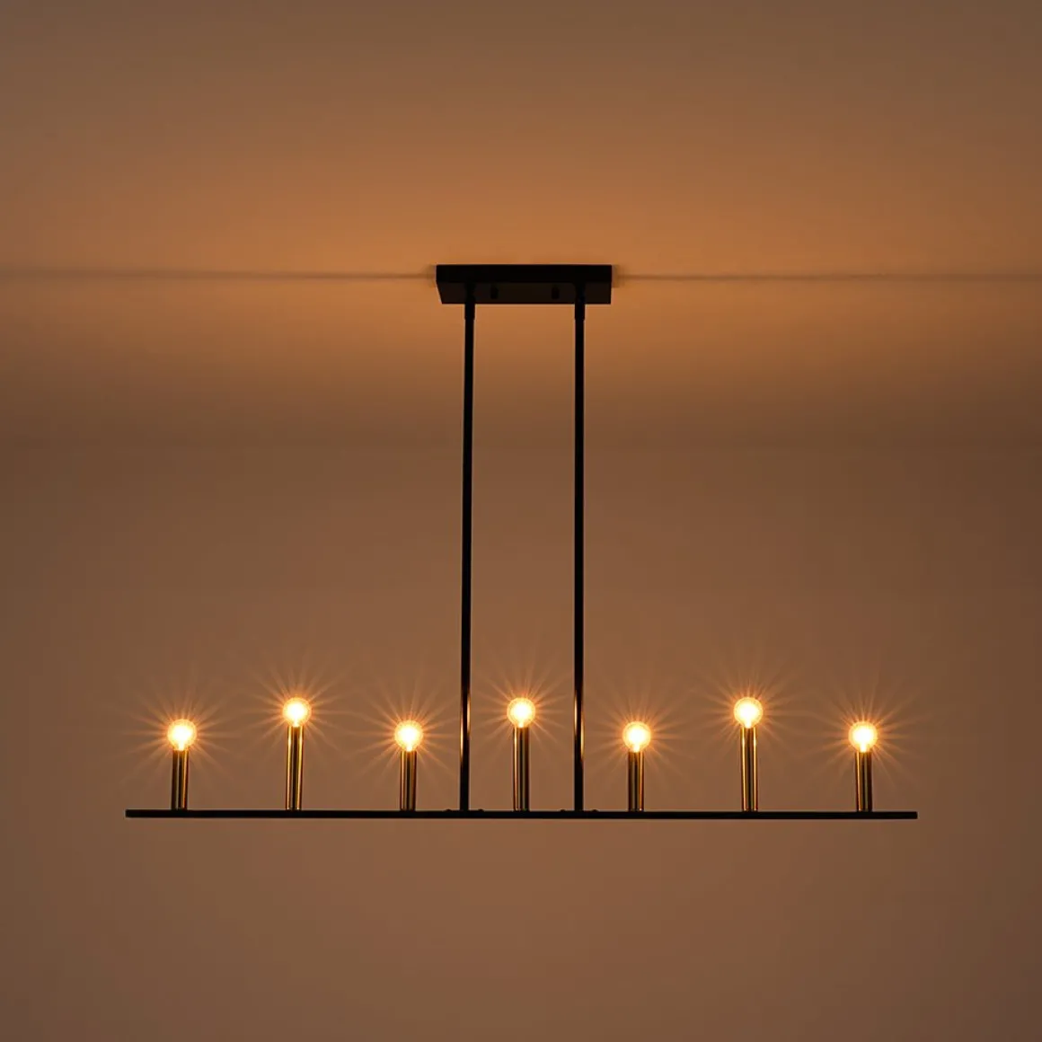 Minimalist Black Brass Candle Style Linear Island Chandelier