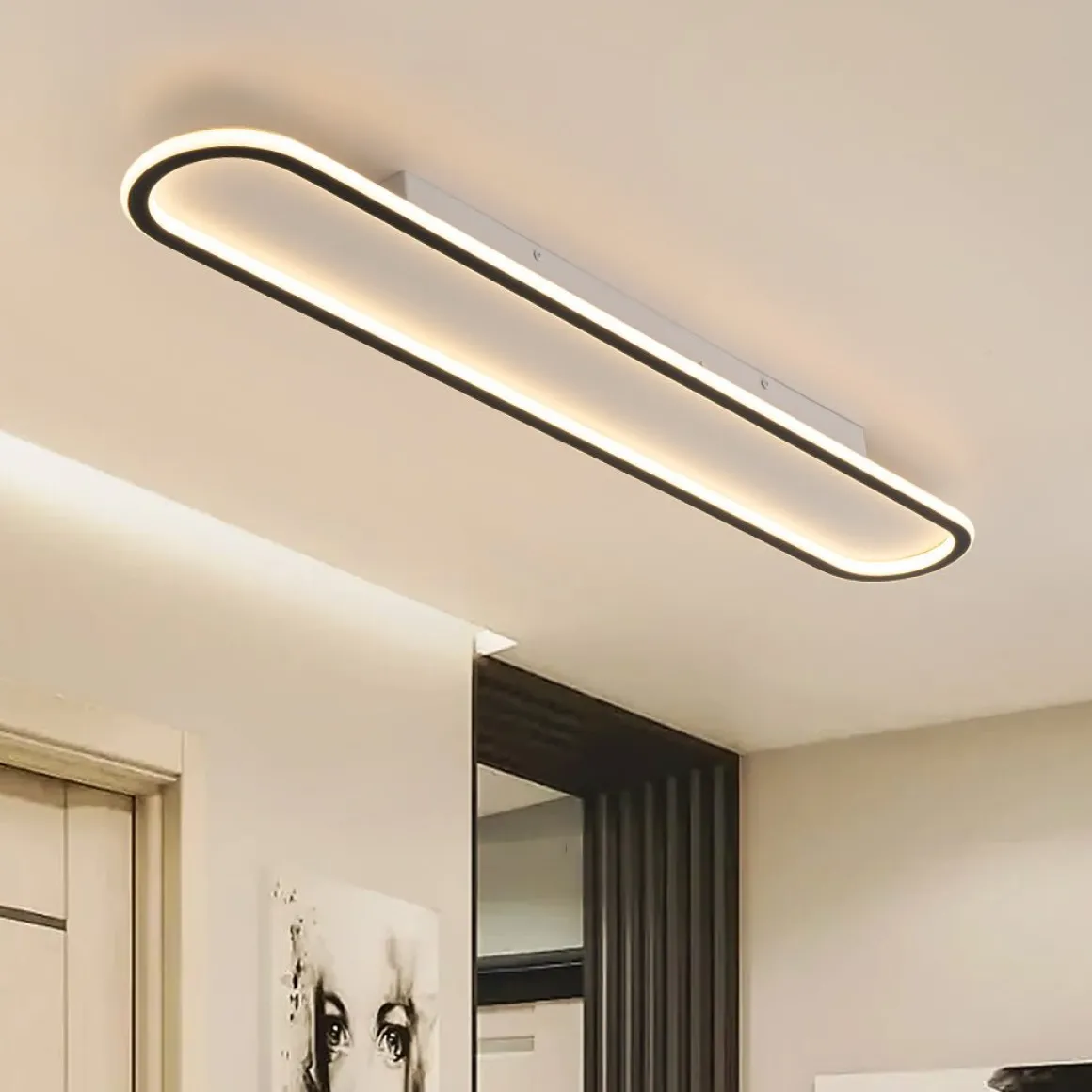 Minimalist Streamlined Oval Warm LED Ceiling Light