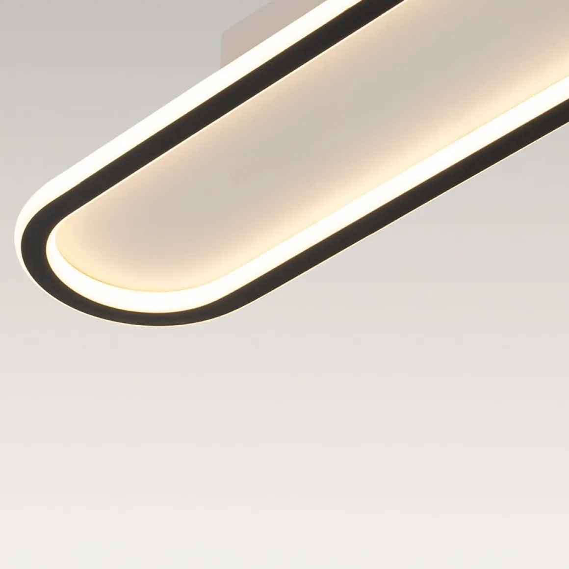 Minimalist Streamlined Oval Warm LED Ceiling Light