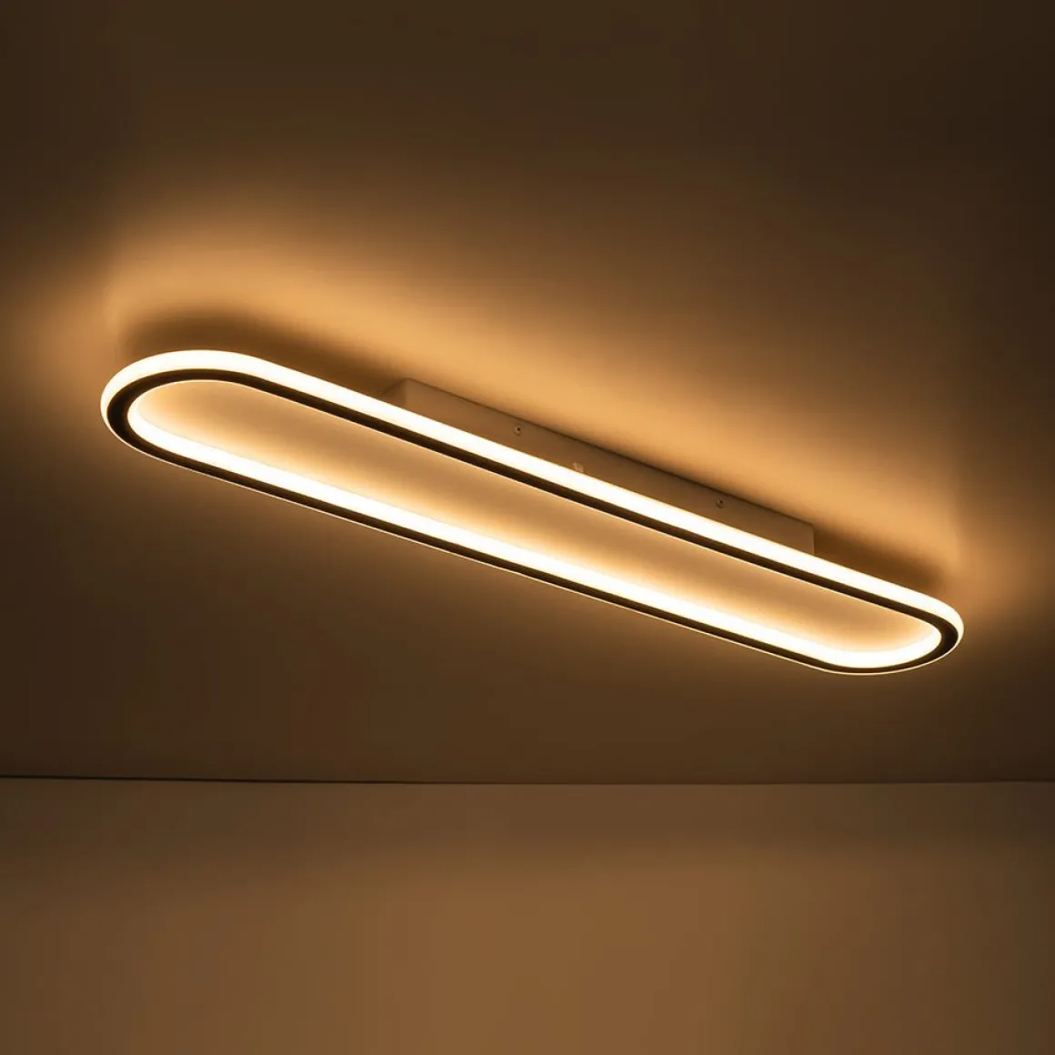 Minimalist Streamlined Oval Warm LED Ceiling Light