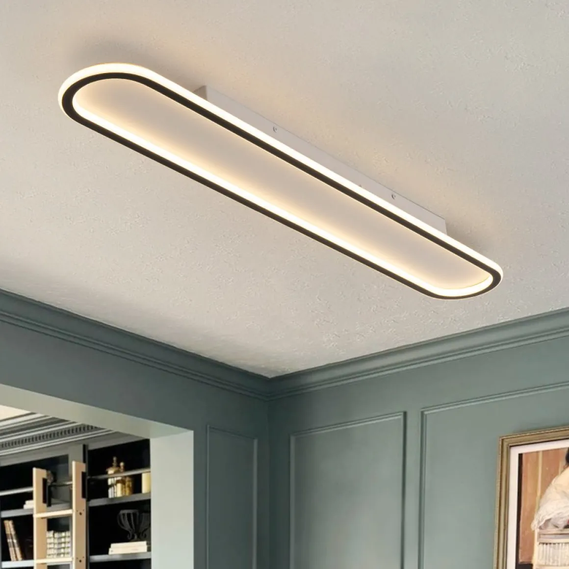 Minimalist Streamlined Oval Warm LED Ceiling Light