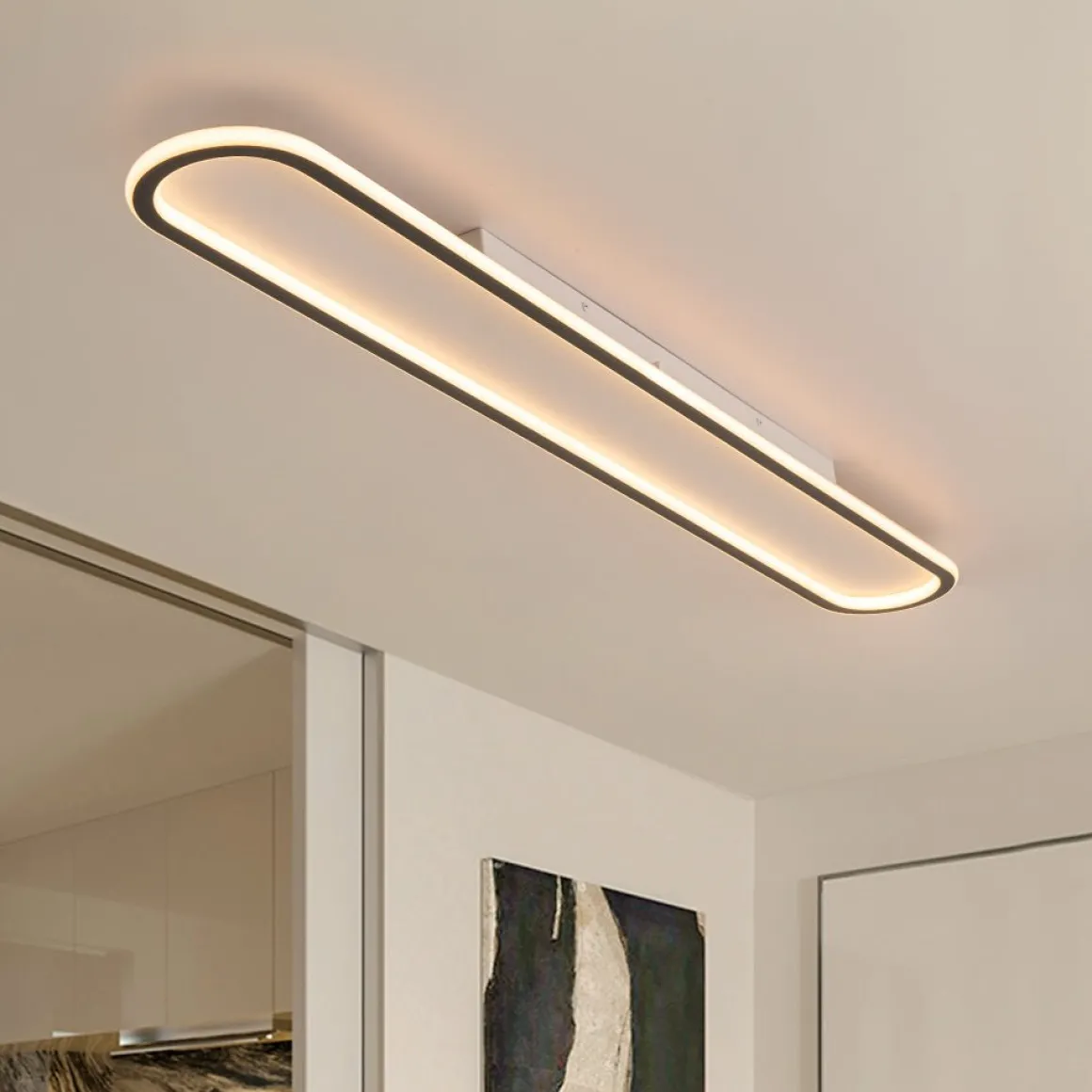 Minimalist Streamlined Oval Warm LED Ceiling Light
