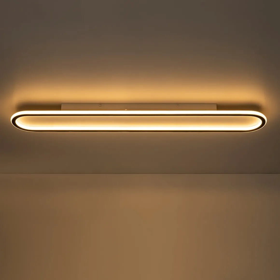 Minimalist Streamlined Oval Warm LED Ceiling Light