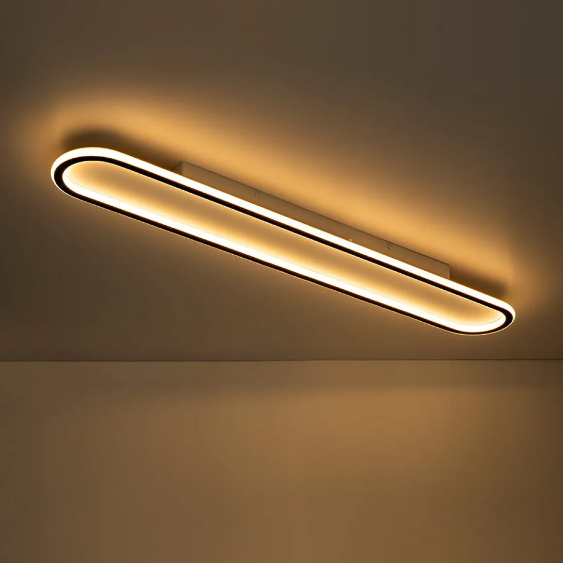 Minimalist Streamlined Oval Warm LED Ceiling Light